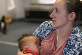 Sarah breastfeeding her son, Zephaniah